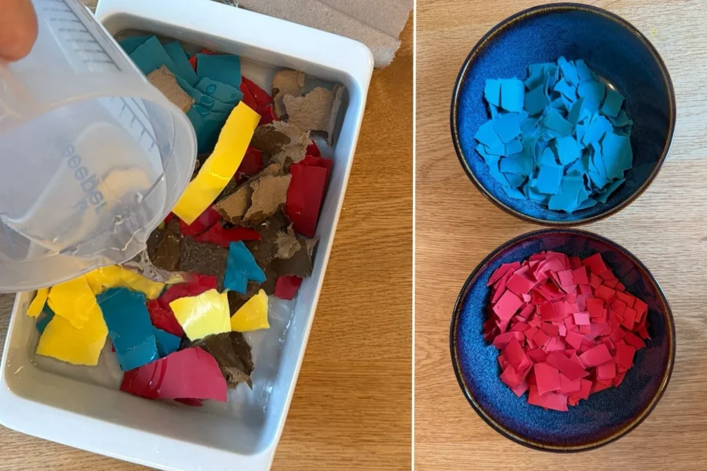 Buntes Papier und Kartonreste werden mit Wasser ĂŒbergossen, daneben farblich sortierte Schalen.