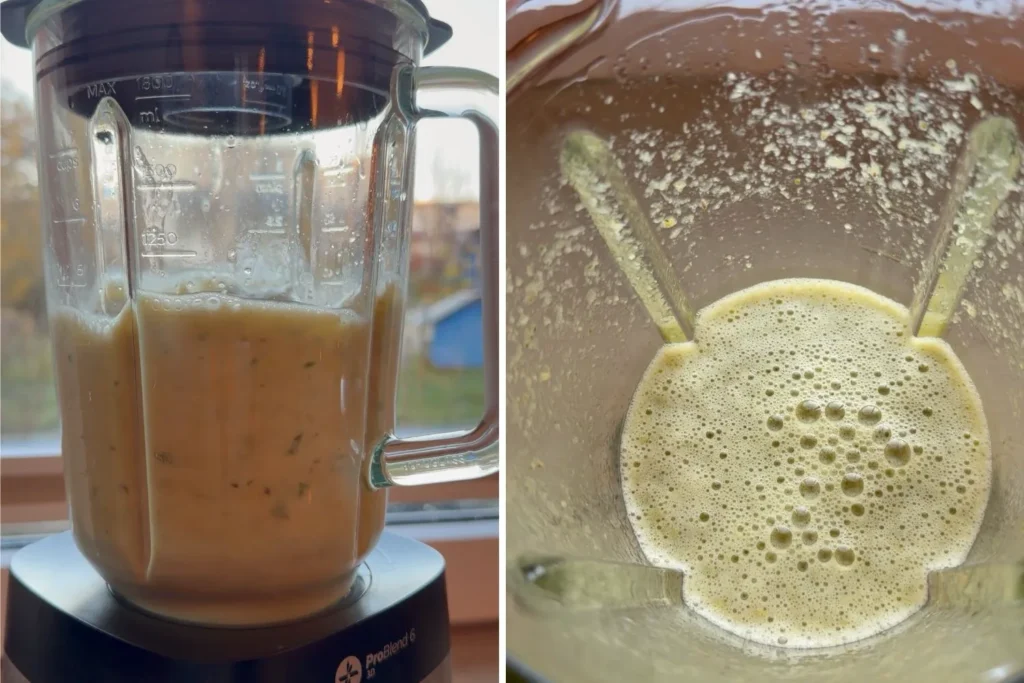 Mixer gefüllt mit frisch gemixtem Ingwer-Shot, gelbgrün und leicht schaumig.